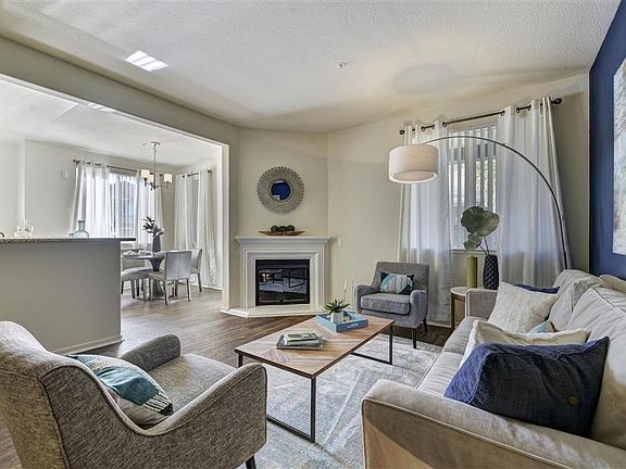 Enjoy an evening by the fireplace found in select homes
