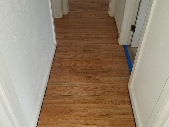 Hallway to the master bedroom and bathroom to the right.