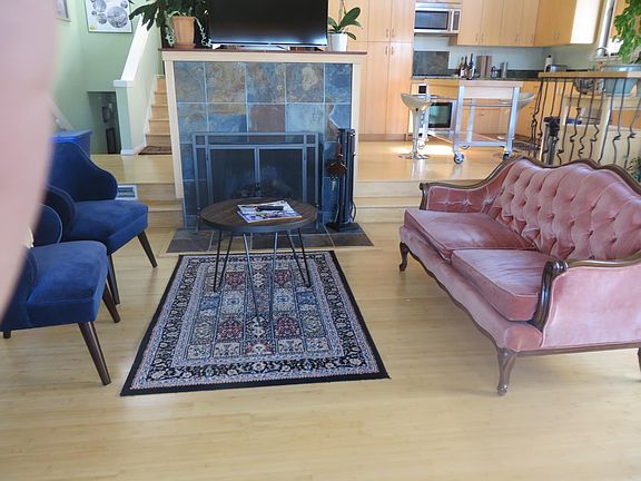 Sunken living room w fireplace