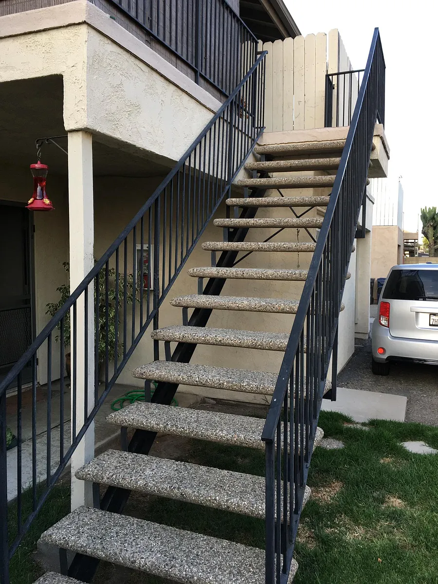 Apt D is upstairs with a small gated patio. Shared laundry room is downstairs. - 17072 Grove Cir #D