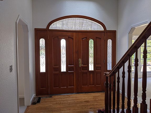 Front Door from Inside. Left side Formal Dining Room and right side Formal room