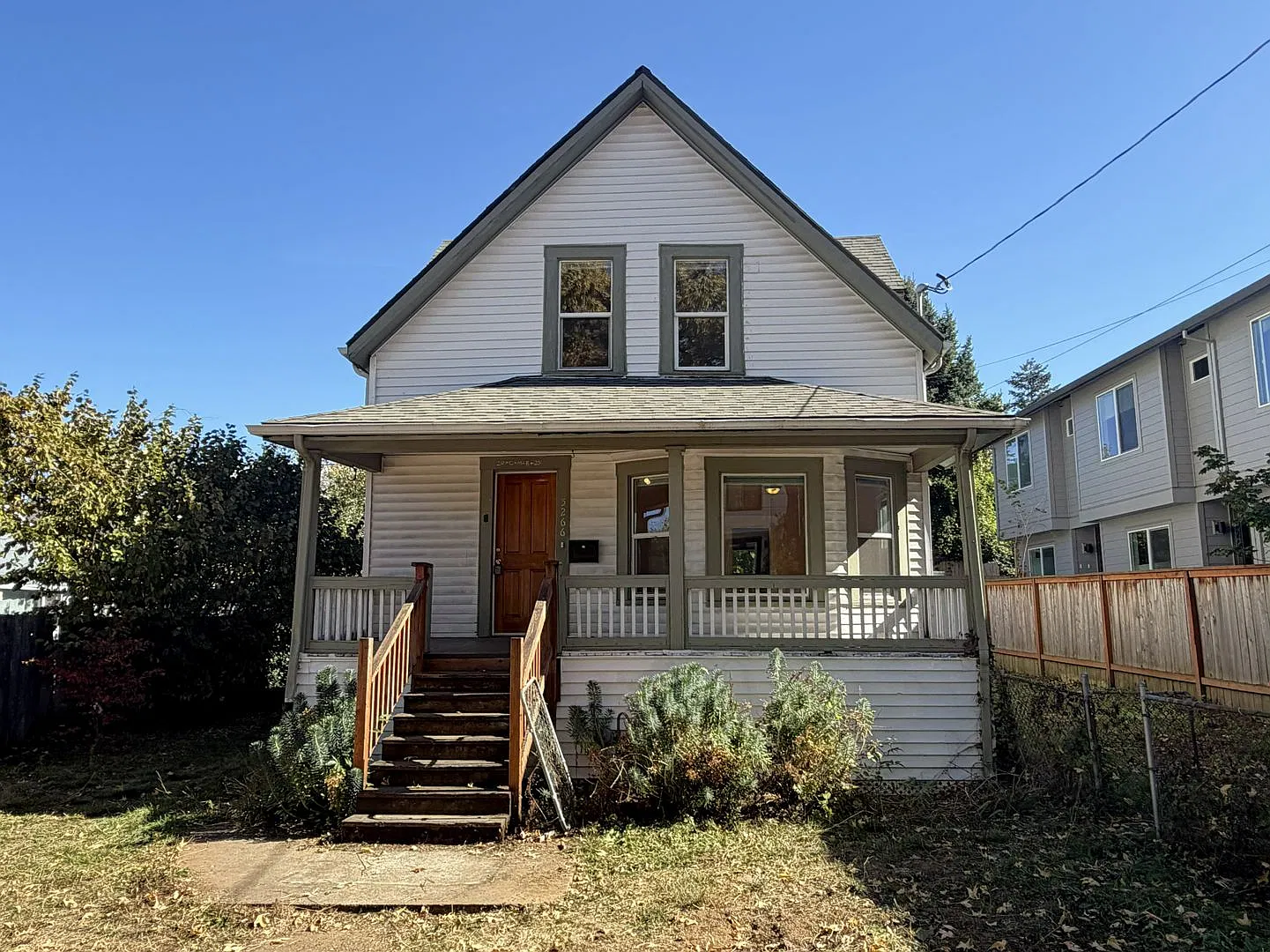 Charming 1907 two-bedroom house with stunning front porch and spacious back yard! — Photo 1