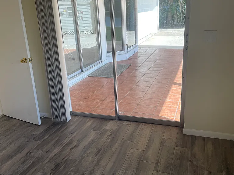 Master Bedroom Pario View and Access with doors that pocket