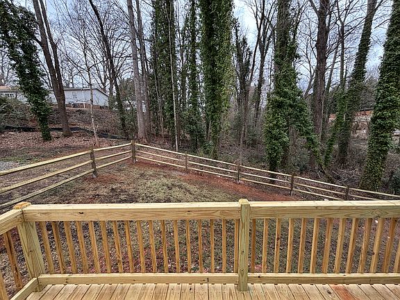 A split rail fence was just installed at the sides and back.