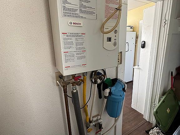 On demand hot water softner