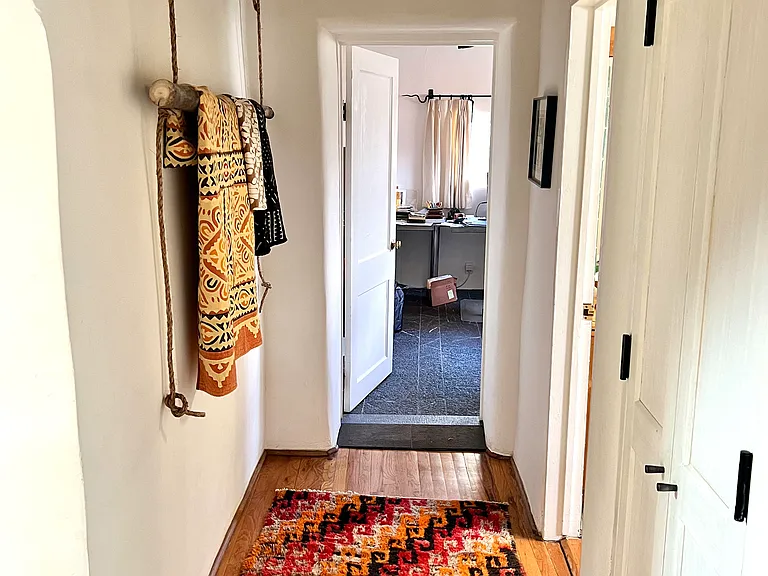 Hallway - bath to the right and second bedroom/office