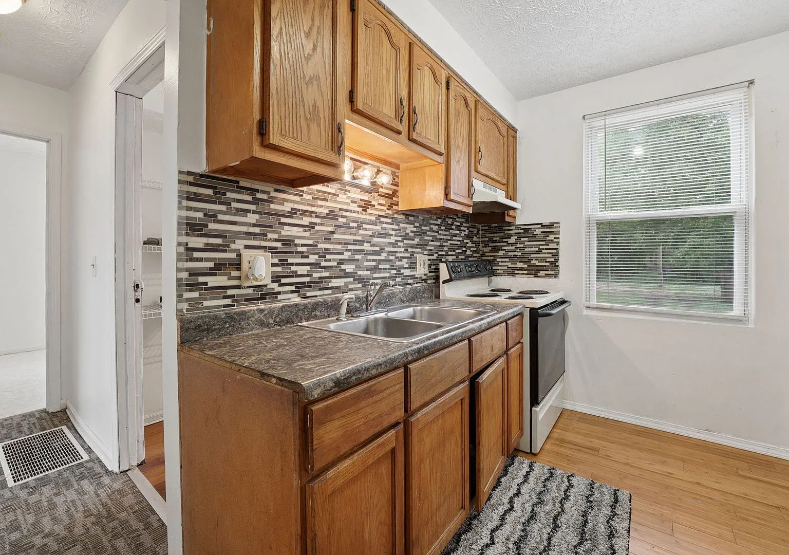 Charming 2-Bedroom Ranch Home | Pet-Friendly | Off-Street Parking | $1150/Month — Photo 2