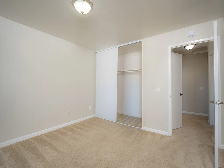 Imagine your personal touch in this bright and inviting bedroom.