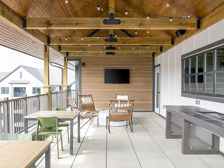 Social elevated outdoor space with seating and string lights