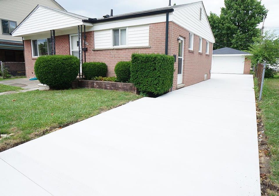 Front - new windows, driveway, steps