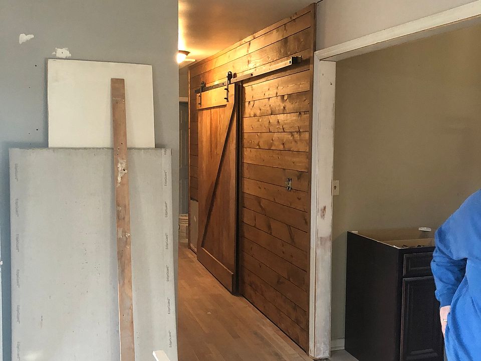 Barn door for laundry room