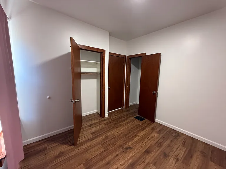 Bedroom 1 - 2 closets and 2 windows