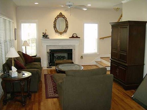 Family Room Features Wood Floors