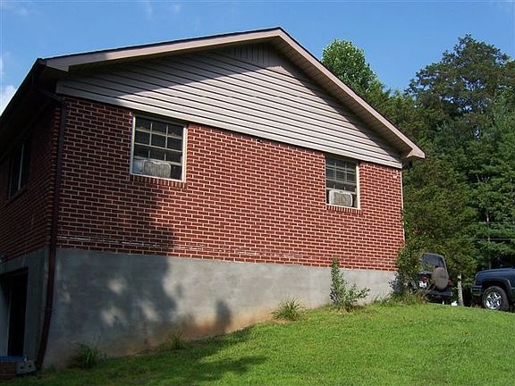 The exterior of the home is brick and vinyl.