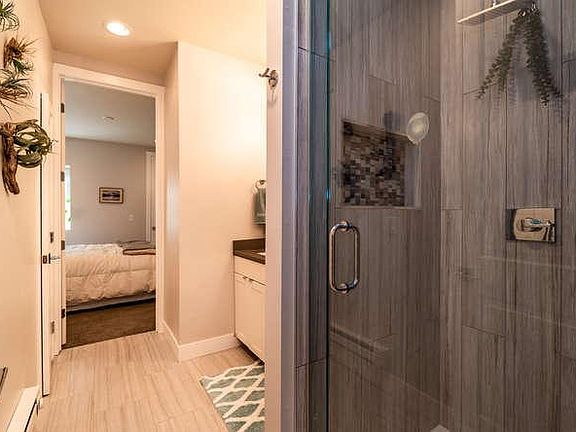 Downstairs suite. Private bathroom with shower and water closet
