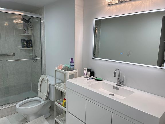 Master Bathroom with top of the line vanity (new) and lighting night bathroom mirror