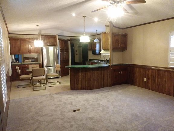 Kitchen and living room. Open layout.