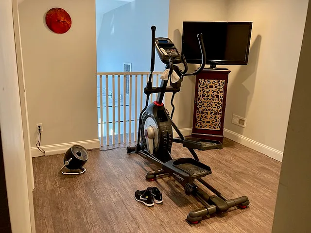 Schwinn elliptical can stay in the loft for new tenant.