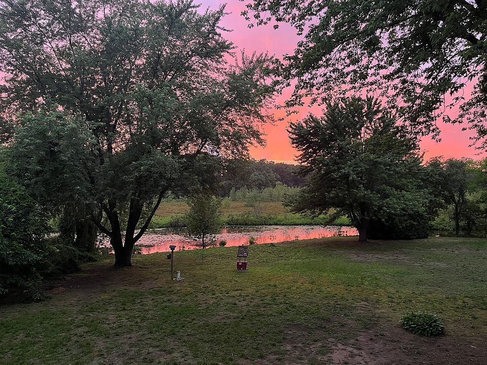 Sunset view over the backyard and pond.