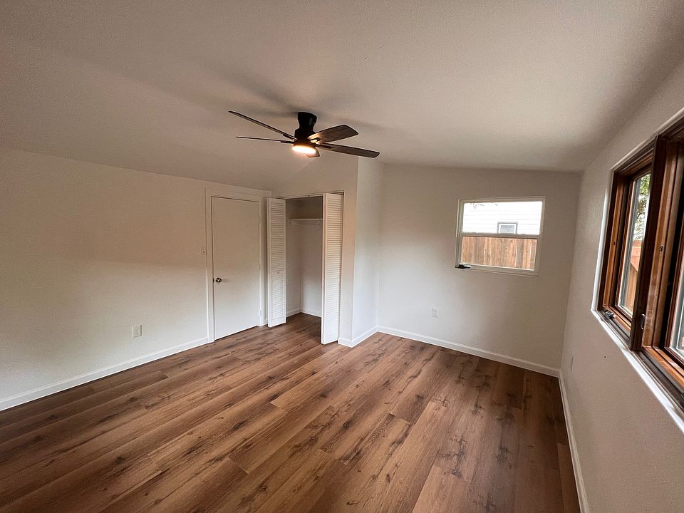 Beautiful fully repainted bedroom with luxury vinyl wood planks.