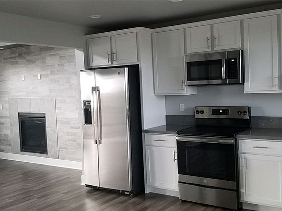 Photo is of a similar home