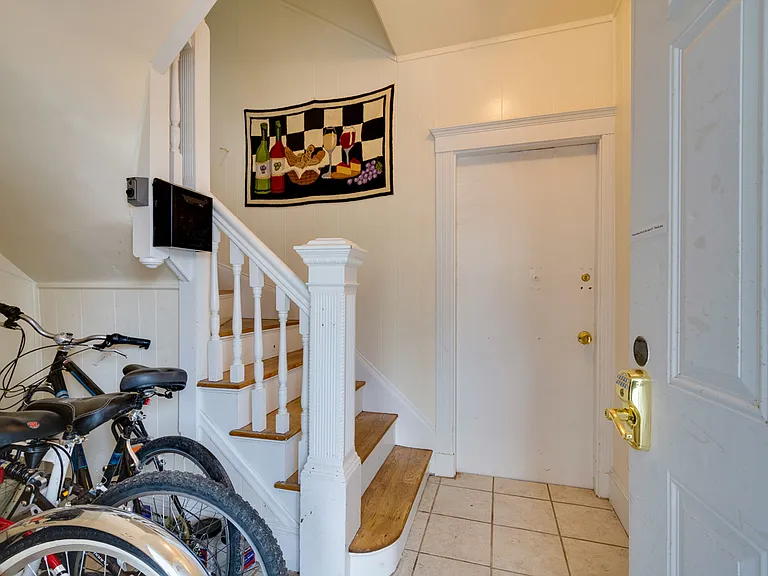 Front entry landing with bike storage