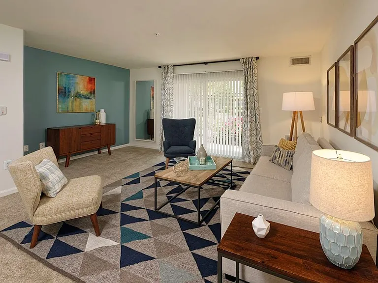 Classic Package I living room with carpeted flooring