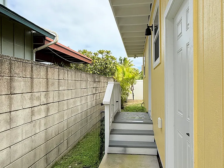 Back of cottage, steps to back door