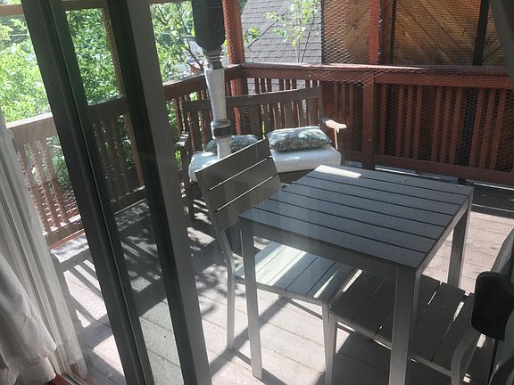 "Catio" - this deck is enclosed with chicken wire