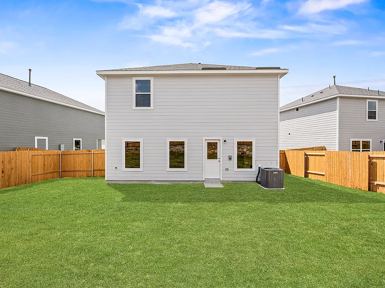 The back yard of the Rayburn is fully fenced-in.