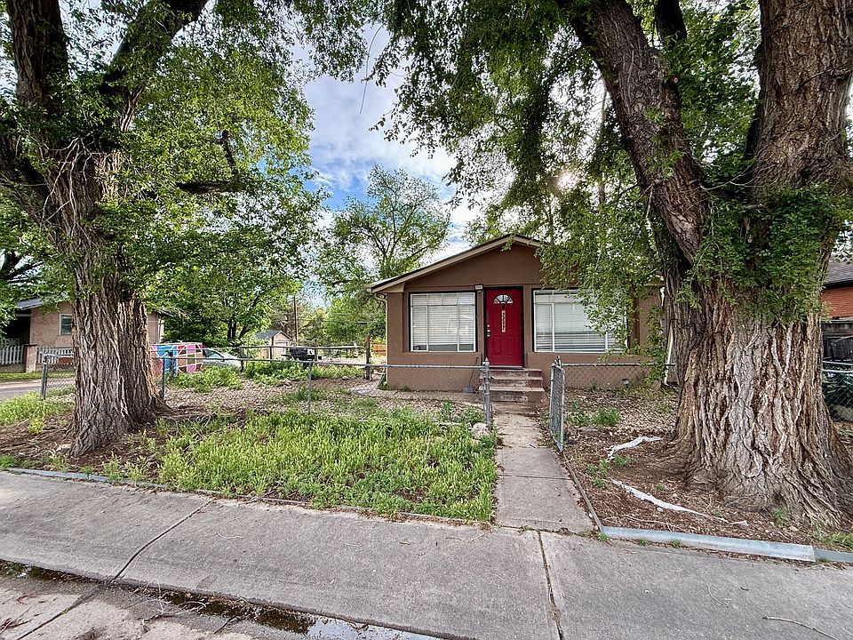 Front yard and front of home has two beautiful mature trees