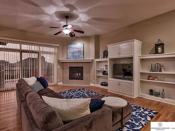 just off the kitchen, a cozy living area yet wide open for entertaining
