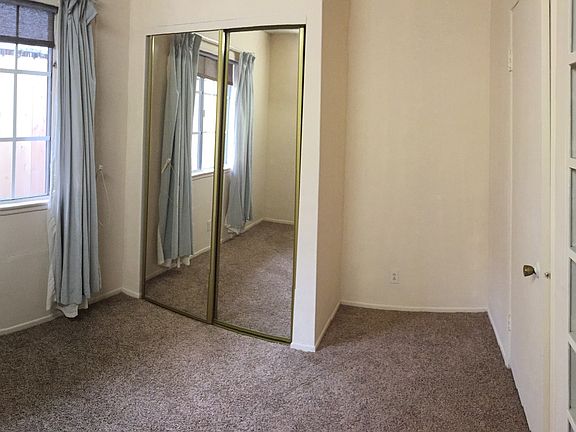 Bedroom 2 with built in shelves