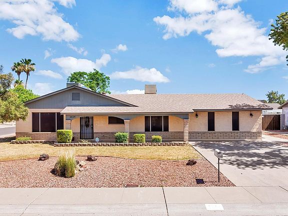 4828 W Columbine Dr-large-001-016-Front
