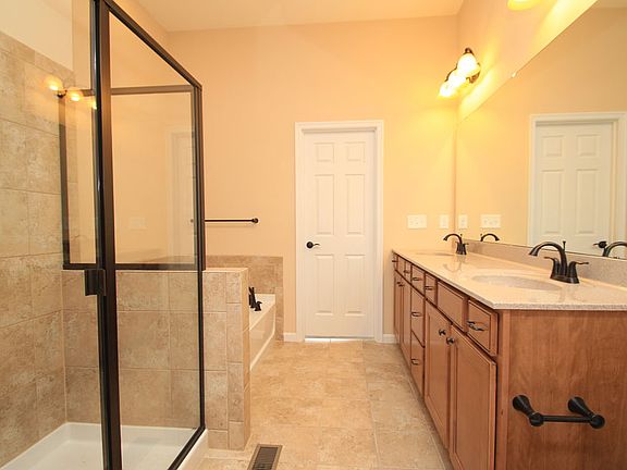 The Brandywine Owner's Bath with glass shower and spa tub