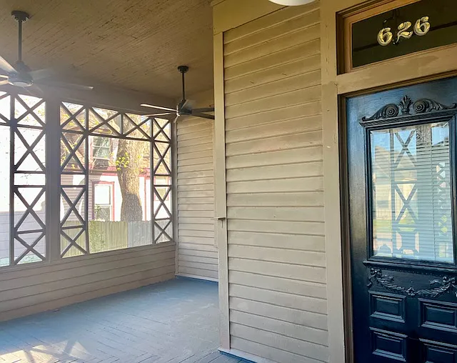 Screened in porch, two ceiling fans. - 626 W Chestnut St