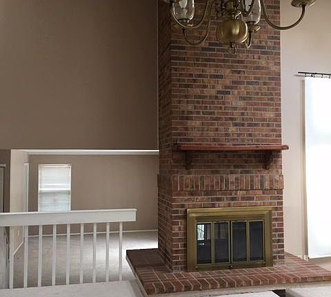 Fireplace between family room and dining room
