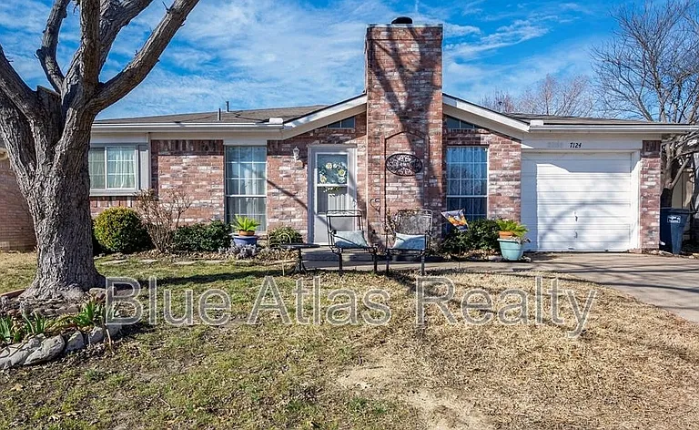 7124 Wagonwheel Rd — Photo 1