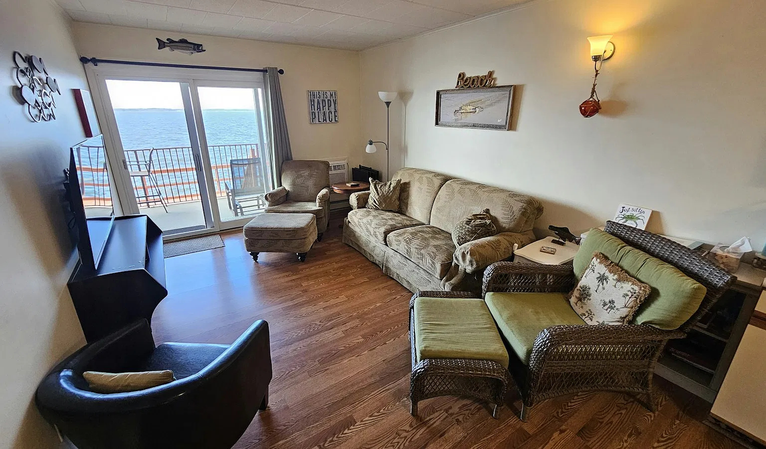 Living room with view and balcony.