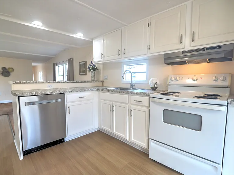 Newly remodeled kitchen with stainless steel dishwasher