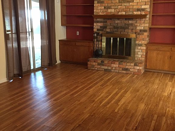 Family room opens to covered patio for great entertaining sp