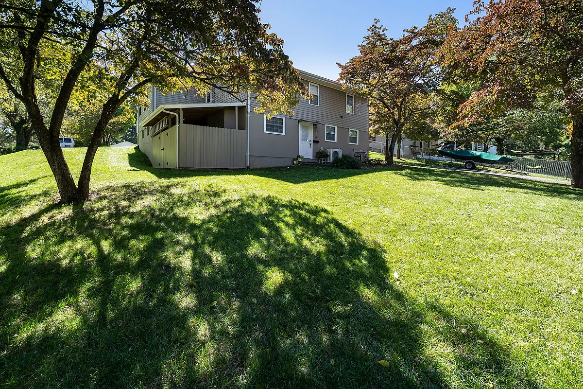 Backyard, basement entry - 487 Kentucky Ave