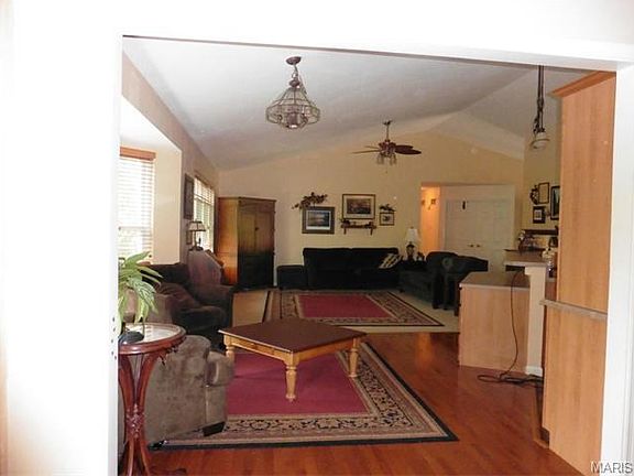 View from dining room through breakfast room and great room