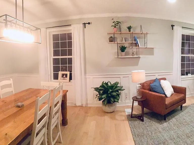 Furnished formal sitting area and dining room.