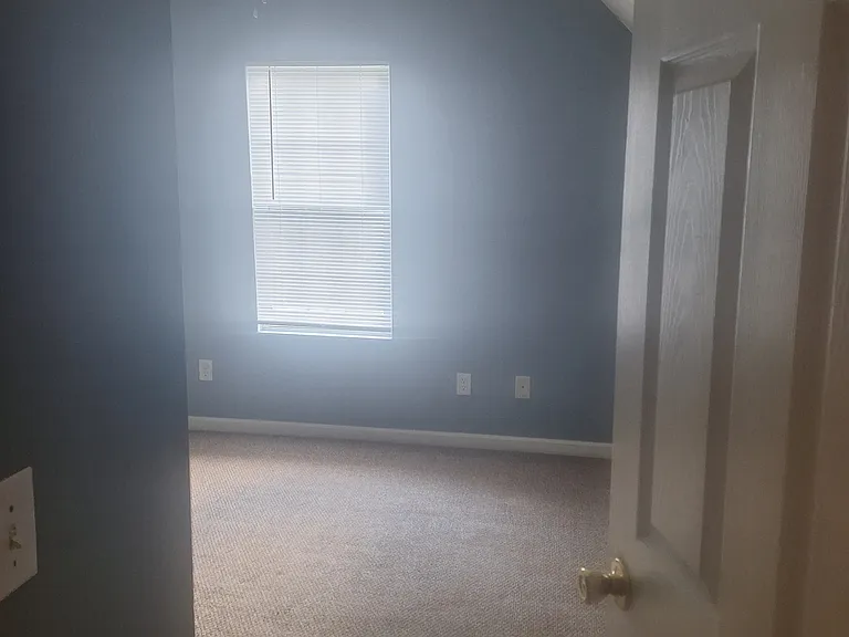 2 bedroom to the left of the stairs