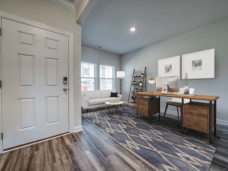 Right off the foyer, useful flex space can be made into an office.