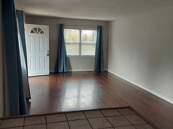 Kitchen island looking towards main entrance.