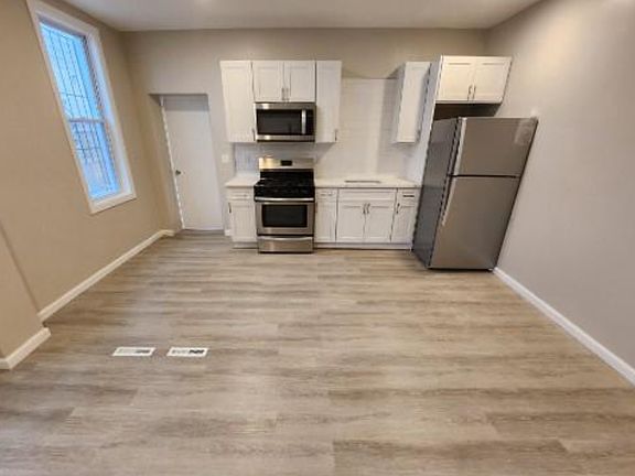 2nd image of 348 W Queen Ln #1A