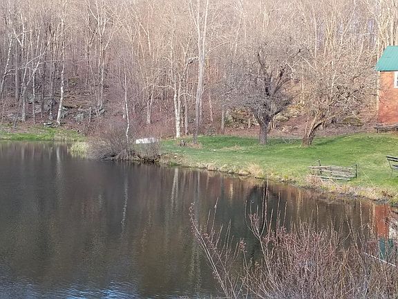 hunting house on top of mountain with private pond