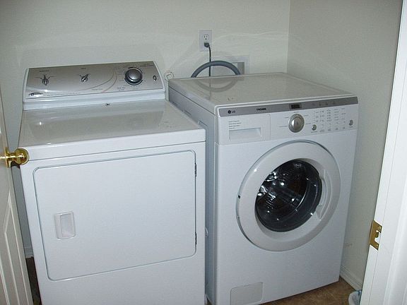 upstairs laundry room next to master bed